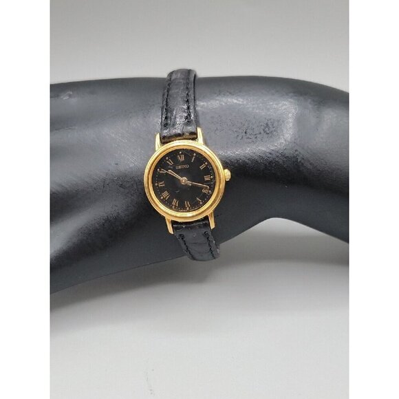 Vintage Seiko Ladies Quartz Watch V401-1409 Black Dial & 7" Band Gold Tone Runs - Picture 1 of 16